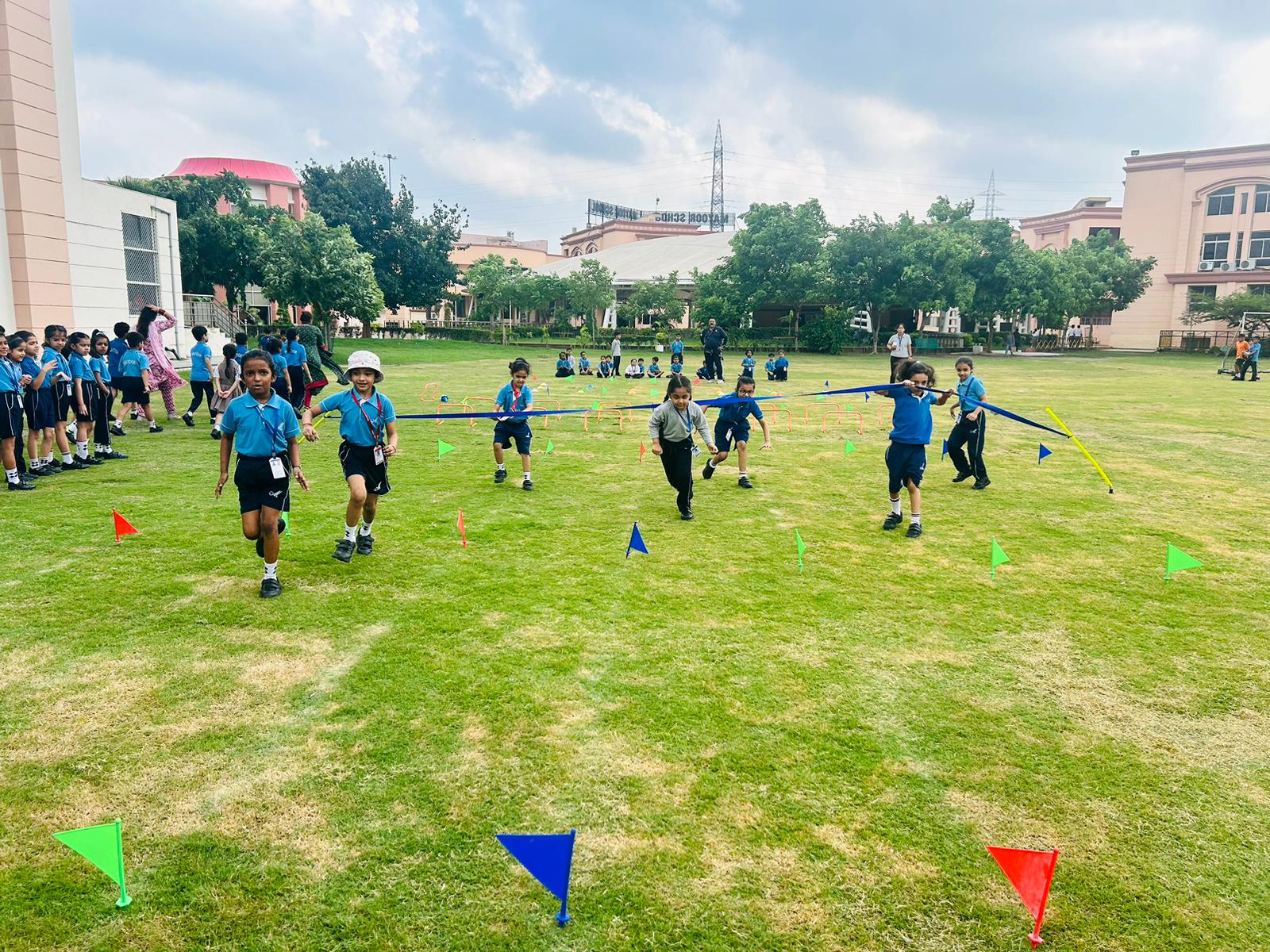 Racing to Success: Class 2 Celebrates National Sports Day with Thrilling Obstacle Course